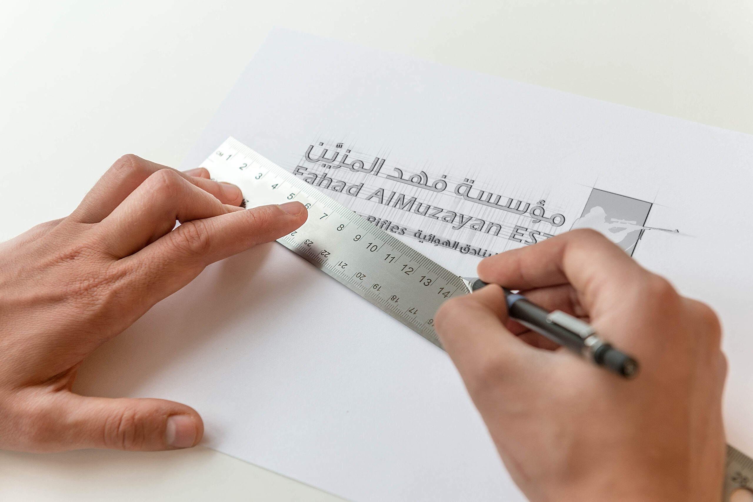 تصميم شعار مؤسسة فهد المزين للبنادق الهوائية